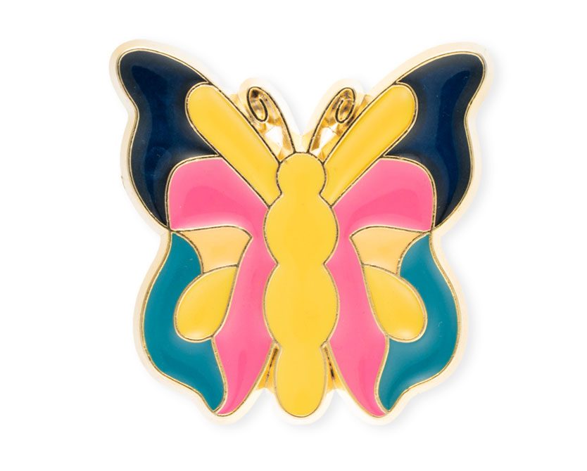 Enameled butterfly pin photographed on white to make colors pop