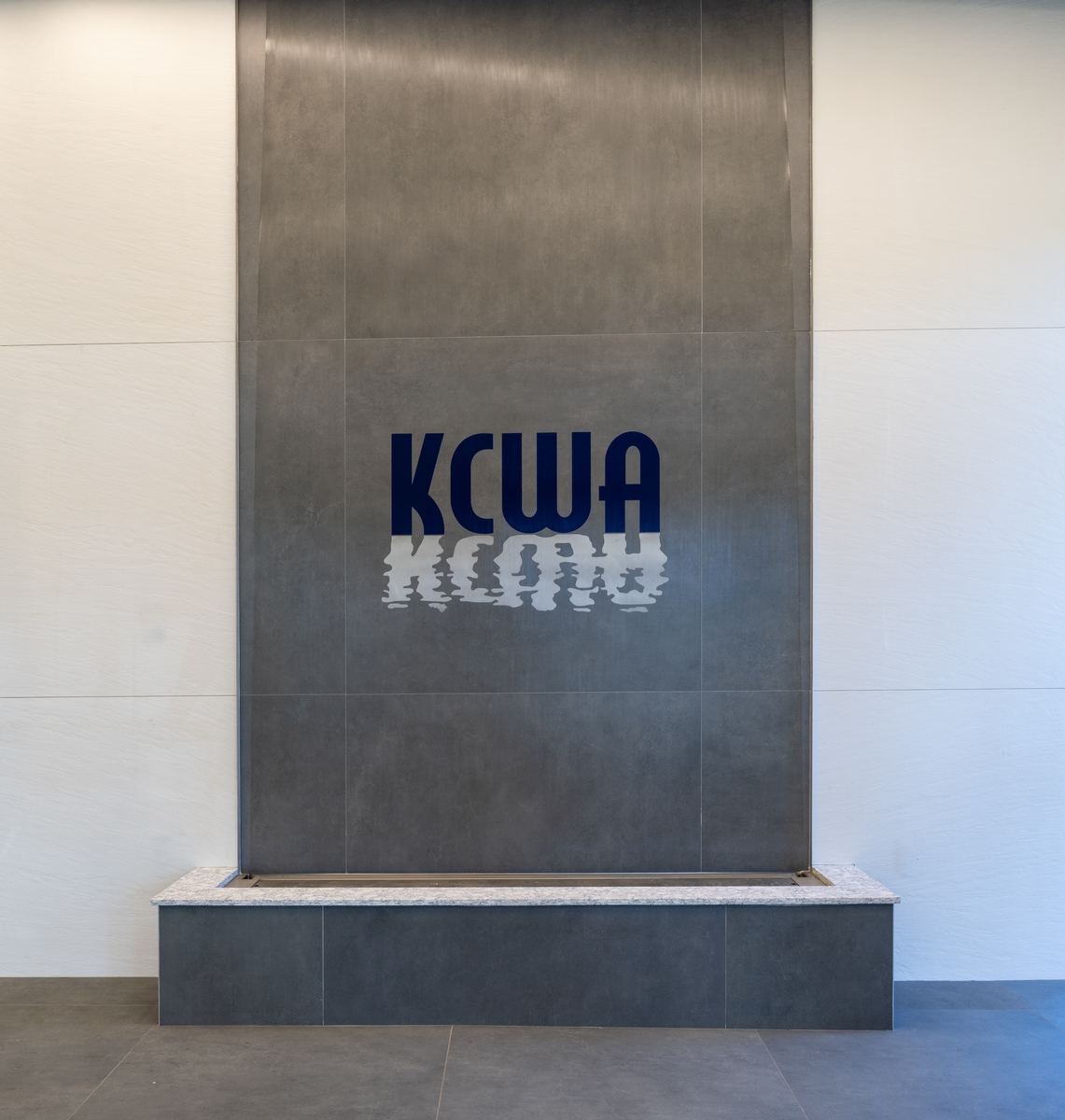 decorative waterfall feature in main lobby of KCWA