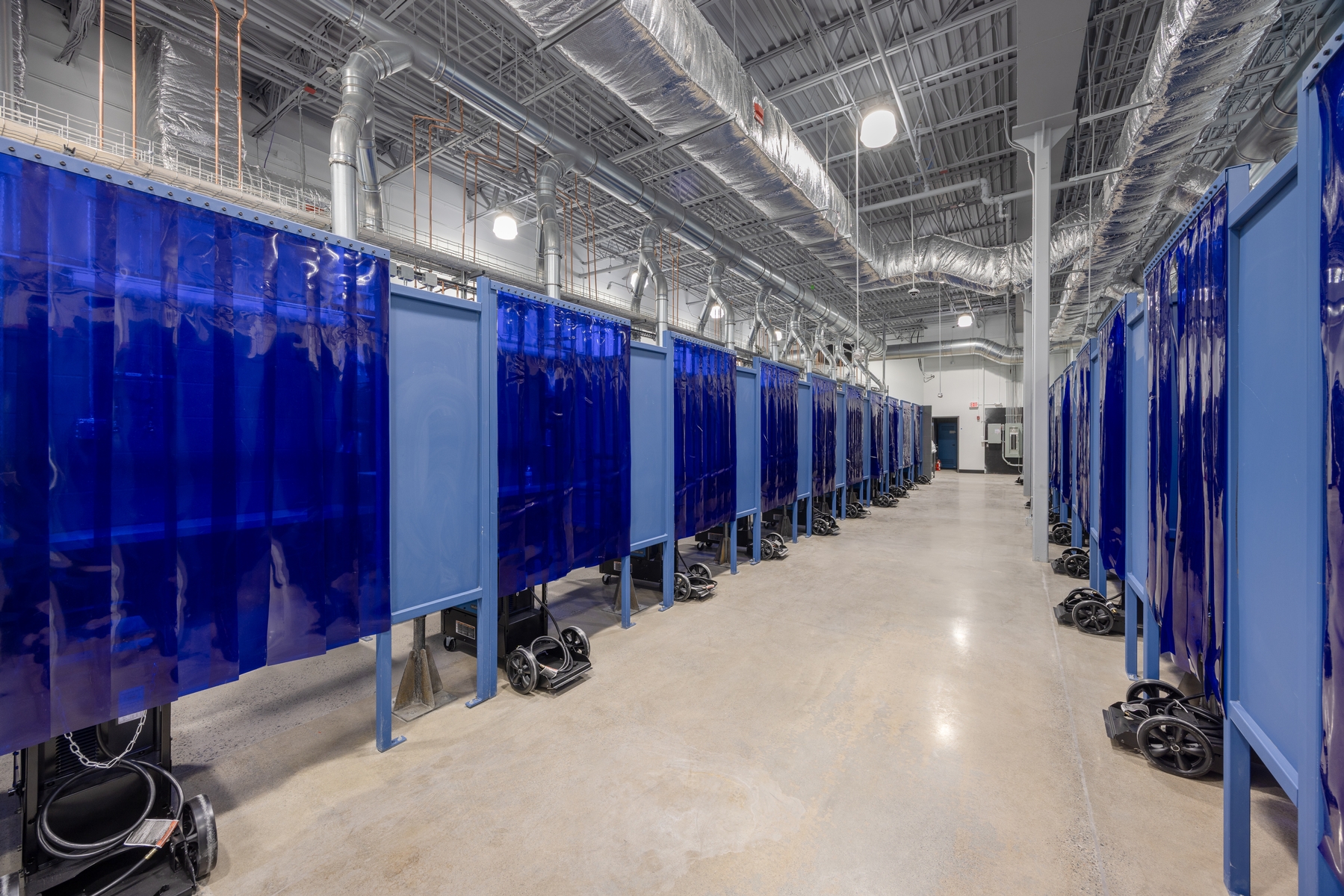 Training booths at Lincoln Tech welding facility