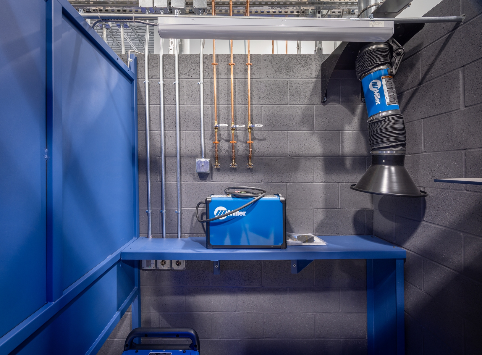 Inside training booth Lincoln Tech welding facility