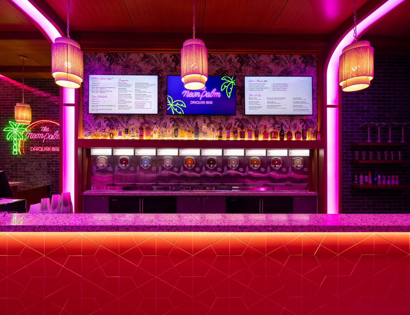 Daiquiri taps and alcohol sections at The Neon Palm