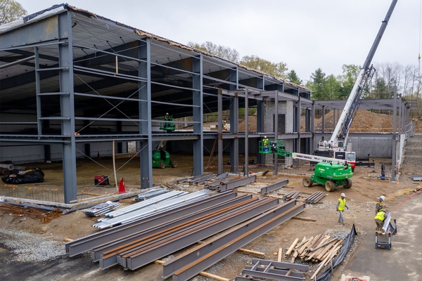 Steel erections progress on a worksite in Massachusetts